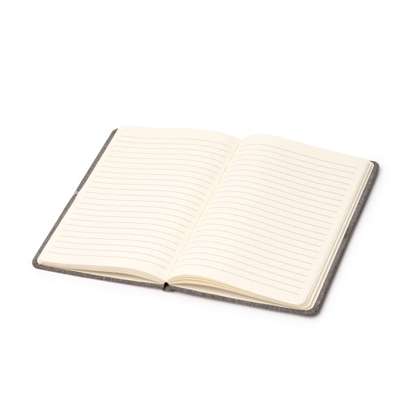 Detalle de la superficie de carga inalambrica de la libreta gris